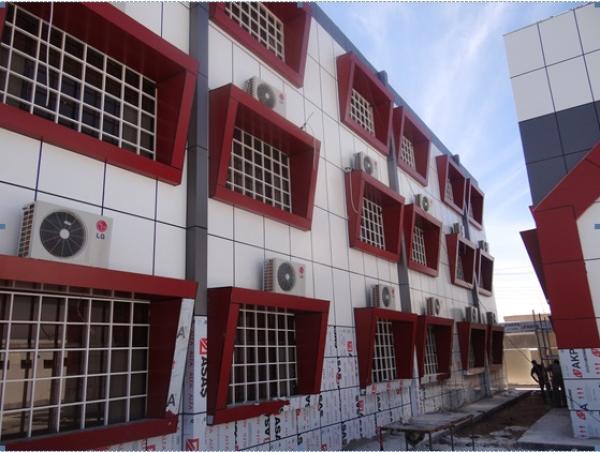 مشروع بناء مدرستين في حي الحسين يصل  مراحله الأخيرة